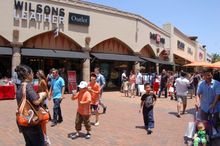 Chinese visitors enjoy shopping for top name brands, substantially discounted, at Citadel Outlets in Los Angeles.