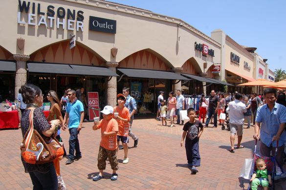 Chinese visitors enjoy shopping for top name brands, substantially discounted, at Citadel Outlets in Los Angeles.