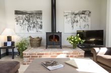The Light, Airy And Attractive Living Space In Whites Ground Is Beautifully Finished With Original Works Of Art Depicting The Ba