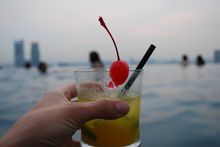 Sophie Singapore Cocktail In Dream Infinity pool