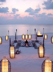 Beach dining at Dusit Thani Maldives 