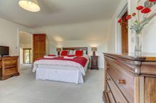 Upstairs Are Four Large Bedrooms.  The Master En-Suite Bedroom Is Furnished With A King-Size Bed, Handsome Bedside Tables With L