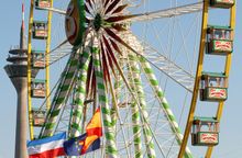 Ferris Wheel In Front Of The Rhine Tower