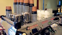 New coffee machine and fresh All Press espresso beans ready for today\'s opening