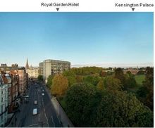 Kensington Palace (right most building) is a short walk from the  Royal Garden Hotel (middle building, across the park from the 