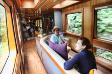 Passenger And Guide In Conversation