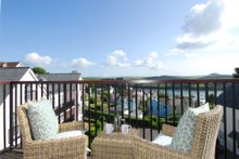 Stunning Elevated Views From The Furnished Balcony Provide A Picture Perfect Location And An Ideal Place To Sit Out And Relax As