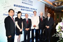 Executives of Changzhou Qiao Yu Group and Dusit International celebrate the opening of the Dusit Fudu Hotels and Resorts managem