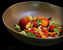 Glazed young carrot salad, whipped avocado, bedugul strawberry, cashew nut, basil. 
