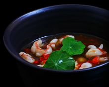 Deep ocean tiger prawn “puddle”, white rice, mild red chili, wild herb. 
