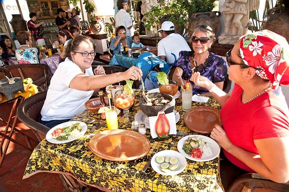 Friends enjoying a meal in Puerto Vallarta