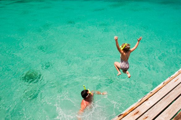Child Jumping Off Jetty