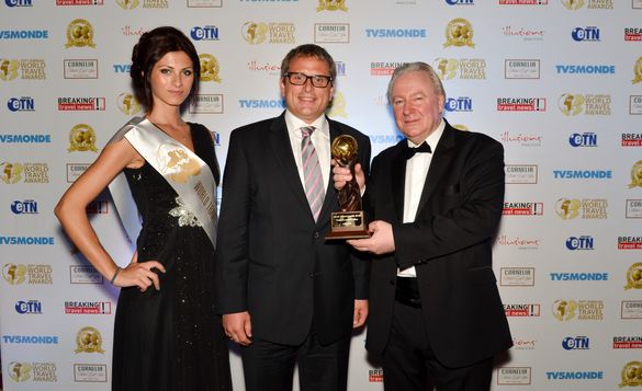 Graham E. Cooke, President and Founder, World Travel Awards (on the right) celebrates the award handover with Lufthansa's Genera
