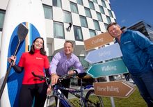ATTA President Mr. Shannon Stowell and Minister of Tourism Varadkar announcing the 2014 Adventure Travel World Summit location i