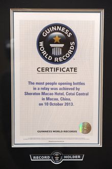 The most people opening bottles in a relay was achieved by Sheraton Macao Hotel, Cotai Central