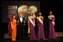 Mr Peter Komposch, General Manager of Dusit Thani Laguna Phuket, accepts three World Travel Awards on behalf of the resort in Du