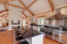 Coombe Farm has an exceptionally well equipped and finished kitchen providing the perfect place to prepare family feast of epic 
