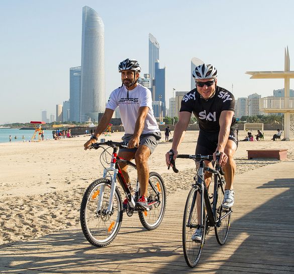 Sir Chris and AbouBaker head out for a ride on Abu  Dhabi Corniche