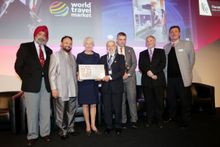 HI President Edith Arnoult-Brill receiving the IPPT Award