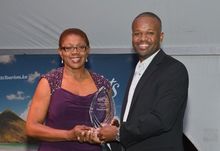 Mrs. Patricia Martin, Permanent Secretary In The Ministry Of Tourism And International Transport, Presented The National Champio