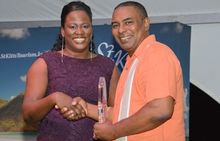 Deputy Chairman Of The Board, Hugh Mallalieu, Presented The Awards Of Excellence To Kendra Jacobs Of American Airlines For Demon