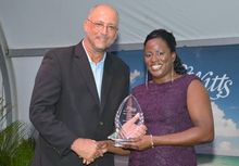 Minister Of Tourism Ricky Skerritt Presents The Pillar Of The Industry Award To Kendra Jacobs, Who Accepted The Award On Behalf 