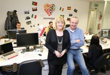Tom and Debbie pictured in the Homestay.com offices. More high res images are available upon request.
