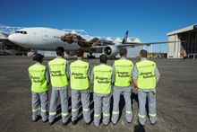 Air New Zealand Dragon Handlers At Auckland International Airport