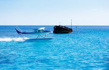 Heron Island by Seaplane taking off past diving wreck