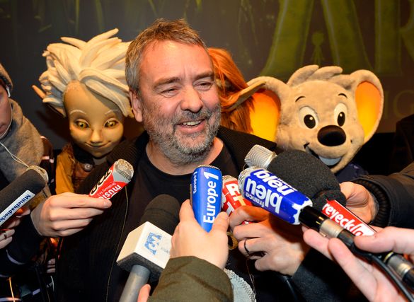 Star director Luc Besson being interviewed by international journalists