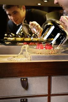 Butler ready to serve afternoon treats from the luxury trunk