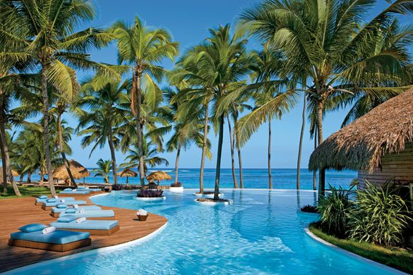 The Tranquil Infinity Pool At Zoëtry Agua Offers Stunning Views Of The Caribbean