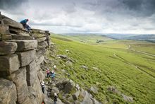Rock climbers on Kinder Plateau neay YHA Edale