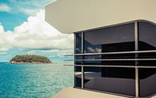 The Kata Rocks Sky Villas, built with wraparound glass and steel – appears like a Superyacht design