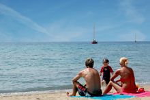 Family On A Beach Holiday
