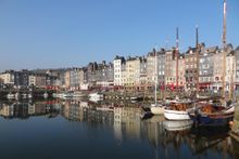 The port of Honfleur in Normandy gives way to interior lands where apples are made into cider and the famous Norman whiskey, Calvados. 