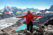 Himalayan Vistas Woman standing on the top o…alaya, Nepal
