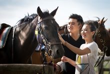 Chinese Couple with horse, Spicers Hidden Vale. Queensland Australia Tourism and Events Queensland