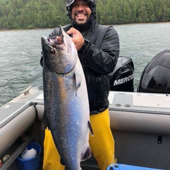 (Caption: First time guest to Waterfall Resort Alaska, Andre Burchette with 47.8 lb king salmon winning King of the Day (KOD) and of the season for that category in the season-long King of Kings Tournament. King of Kings awards cash, return trips, Cabela’