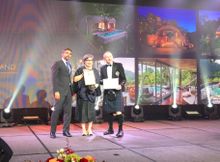 Ms. Nurat Adibaedya Accepts Award on Behalf of Keemala