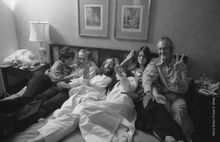 John, Yoko and friends relaxing during the Bed-in for Peace