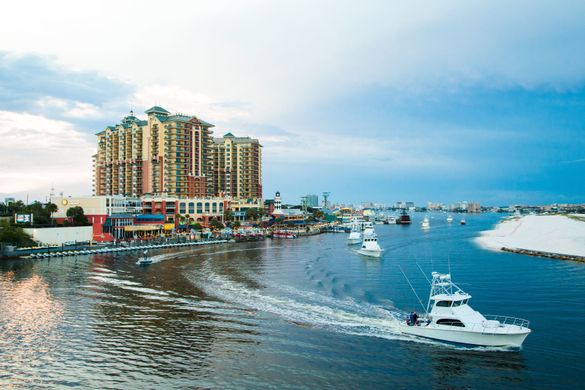 Located alongside Destin Harbor, HarborWalk Village offers easy access to fishing charters and recreational boats, restaurants, shopping and a multitude of water-based activities.