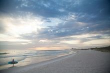 Okaloosa Island is a narrow three-mile stretch of white sand between the cities of Fort Walton Beach and Destin. The island invites visitors to unwind on several public beaches and parks.