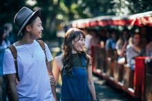 Japanese Couple Watching Train