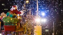 Santa Claus sails down the route as the final float in the Lights Festival parade, officially kicking off the holiday season alo