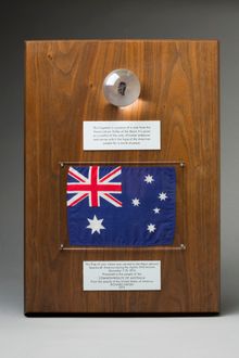 Fragment of moon rock mounted in a Perspex globe with a small Australian flag, carried on board throughout the Apollo 17 mission to the moon and back. 