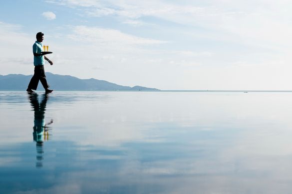 Hansar Samui Infinity Pool with Waiter