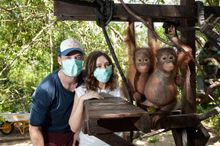 Zoe and Hamish Blake with orangutans