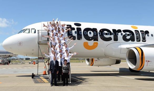 Tigerair Australia CEO Rob Sharp With Brisbane Based Crew and Queensland Minister For Tourism And Major Events Hon Jann Stuckey 