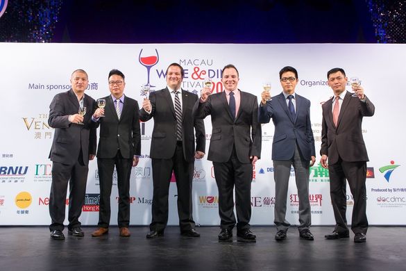 Officiating guests kick off the festivities of the Macau Wine and Dine Festival 2014 by unleashing a life-size jack-in-the-box T